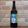 Bouteille Mister Sexapils Pilsner 75cl de Ouest Coast Brewery devant un mur de briques