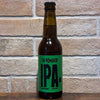 IPA blonde 33cl 4,3% – La Rombière, bouteille à étiquette verte sur fond de briques